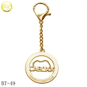 Wholesale gold plated metal keychain maker hollow letter handbag metal hang plates with hook