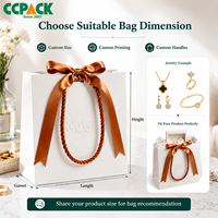 Sacs en papier kraft blanc personnalisés avec logo Ccpack, poignée tressée de luxe, ruban à nœud, emballage cadeau pour bijoux, boutique de mode