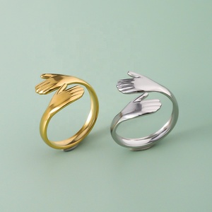 Anillo de Acero Inoxidable con Diseño de Abrazo de Amor |   Joyería con Diseño Único de Manos Abrazadas |   Anillo de Dedo Ajustable Minimalista para Mujer - Product Image 1