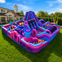Parcours d'obstacles gonflable géant commercial avec toboggans, piscine à balles et mur d'escalade pour enfants
