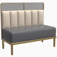 Ensemble de salle à manger au design moderne haut de gamme pour restaurant occidental Table en pierre de luxe avec cadre en métal doré Chaises en cuir de haute qualité
