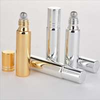 Flacon à bille en verre plaqué or jaune et argent de luxe 5ml/10ml avec diffuseur en acier traité UV pour sérum de soin de la peau