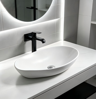Lavabo rond design moderne en porcelaine artistique pour salle de bain d'hôtel