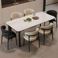 Table à manger en dalle moderne minimaliste italienne pour un usage domestique, petits espaces, avec pieds en acier au carbone + plateau en granit