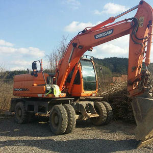 Excavadora de Ruedas DX140W-7 DOOSAN Usada, Excavadora de Ruedas DH150 DH140 DX140 DX60W en Venta en SHOCK - Product Image 1