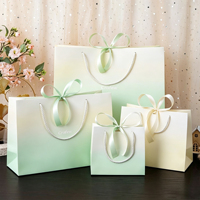 Sac en papier de luxe pliable avec poignées personnalisées, design élégant, pour emballage et cadeaux, prix usine
