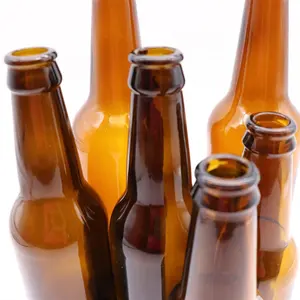 Bouteille en verre de boisson de bière personnaliser estampage à chaud bouchon de couronne 250ml bouteille de bière transparente bouteille de bière à long cou recyclable 330ml ambre