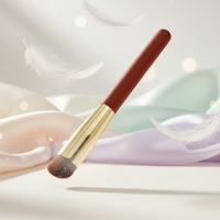 Pinceau correcteur de luxe à pointe ronde avec poils synthétiques et manche en plastique pour le maquillage du visage