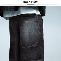 Jean baggy en denim noir délavé vintage, coupe large et oversize, pour homme, avec coutures contrastées aux genoux, style décontracté, personnalisé