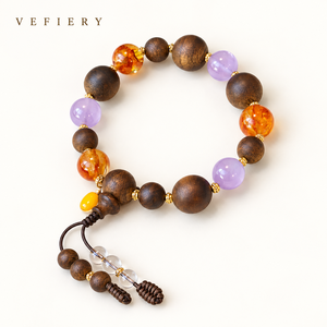 Bracelet en bois et pierres précieuses mélangées avec des perles cylindriques et un pompon perlé - Product Image 1