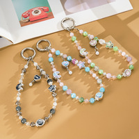 Chaîne de téléphone portable pour poignet avec pendentif en perle en forme de cœur, étoile et lune bicolores, breloque anti-perte haut de gamme pour téléphone mobile