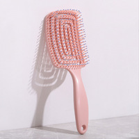 Peigne à cheveux magique carré en plastique Ergonomie Brosse à cheveux incurvée à usage quotidien avec poignée