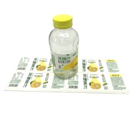 Autocollants d'étiquettes de bouteilles en PP transparents de haute qualité, personnalisés, imperméables, adhésifs, écologiques, à forte adhérence, vernis UV, emballage