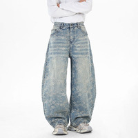 Pantalon ample à jambes larges, pantalon tendance à coupe incurvée, pantalon en jean jacquard tendance à motifs végétaux et floraux