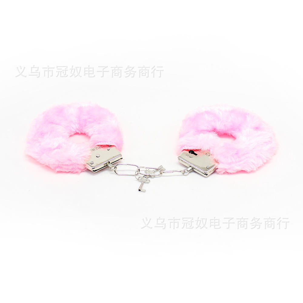 Pink plush realistic hand cuffs