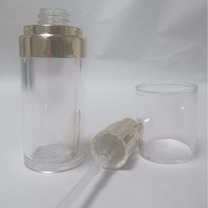 Flacon cosmétique en acrylique Bogun 30 ml transparent avec tête de pompe dorée - Product Image 1