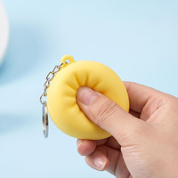 Porte-clés Mini Dumplings 2026 en silicone, jouet anti-stress lumineux à expression mignonne, breloque de sac de dessin animé