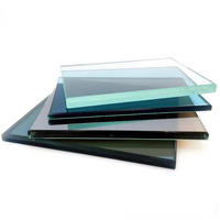 Vidrio laminado templado transparente solar de 10 mm utilizado para muros cortina y deflectores de escaleras comerciales.