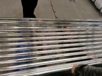 Tôle de toit en acier ondulé Tôle de toit galvanisée Tôle de toiture en métal de zinc