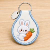 Porte-clés personnalisé en acier inoxydable avec étiquette tissée et broderie de panda, directement de l'usine, pour cadeau promotionnel d'entreprise