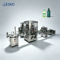 Unité de remplissage à pompe à engrenages ESKO 4 têtes pour lubrifiants, huiles moteur, liquides chimiques, avec équipement d'intégration de capsulage de bidons