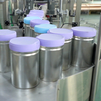 Machine automatique de remplissage, scellage et capsulage pour ligne de production de lait en poudre protéiné, avec système de scellage sous vide pour boîtes de conserve