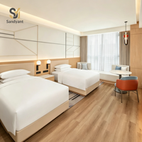 Fournisseur de projets de mobilier haut de gamme pour hôtels et résidences : Ensemble de lit king size en bois et meubles de chambre personnalisés pour coin salon