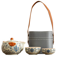Service à thé Kung Fu en céramique Ru de style chinois moderne haut de gamme, motif lotus bleu et blanc entrelacé, portable pour usage domestique, personnalisable