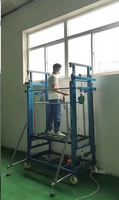 Plateforme élévatrice électrique pliable CE/ISO, capacité de charge 500 kg, haute portée 12 mètres pour la construction