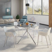 Table basse ronde moderne avec plateau en marbre, série XT, base trépied en métal pour salon