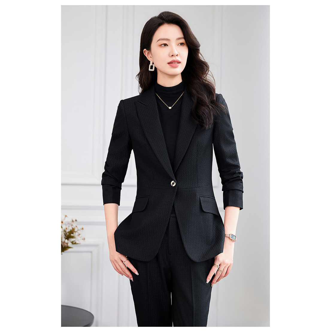 Black suit with slightly flared trousers
