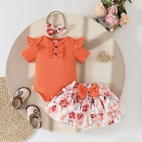 Ensemble d'été 2026 pour bébé fille : Barboteuse à manches courtes à volants avec nœud floral et jupe superposée en polyester