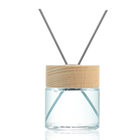 100ml 150ml Bouteilles de diffuseur de roseau d'arôme en verre clair de luxe avec bâtonnets Couvercle en bois de bambou personnalisé
