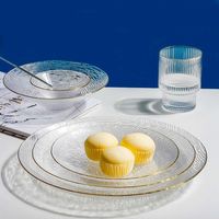 Ensemble élégant de assiettes et de bols de service en verre transparent pour mariage