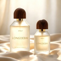 Flacon de parfum vide en verre noir mat de luxe, 30ml 50ml 100ml, cylindrique, avec capuchon en bois foncé en forme de dôme, provenant d'un outlet d'usine.