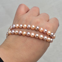 Nouveau produit Perles rondes naturelles couleur bonbon 40cm 7-8mm Perles d'eau douce sans noyau Matériel de collier semi-finis DIY Vente en gros