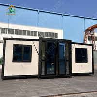 Maison conteneur préfabriquée extensible à 2 chambres avec panneaux sandwich en acier, bureau écologique, mini-maison prête à être expédiée