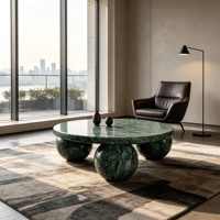 Table basse ronde de luxe en marbre vert avec base sphérique en marbre naturel au design minimaliste