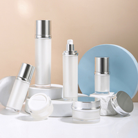 Pot de crème en acrylique, coffret de soins de peau, pour cosmétiques, luxe, pompe, Lotion sans air, bouteille cosmétique avec capuchon en argent, vente en gros, 10 pièces