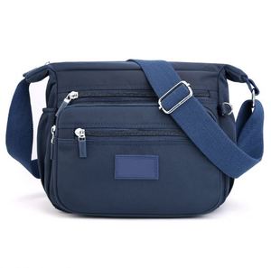 Sac bandoulière 2-en-1 pour femme avec logo personnalisé, en tissu haut de gamme et cuir PU, avec porte-monnaie, fabrication OEM - Product Image 1
