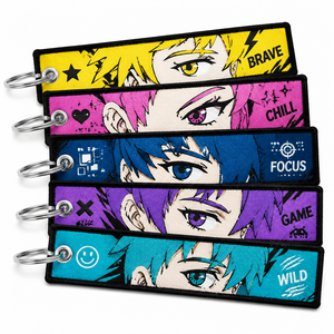 Llavero <span class=keywords><strong>de</strong></span> tela <span class=keywords><strong>de</strong></span> poliéster con logotipo personalizado al por mayor, cordón bordado <span class=keywords><strong>de</strong></span> anime, llavero tejido. - Product Image 1