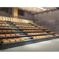 Tribune télescopique électrique avec sièges à accoudoirs rembourrés pour auditorium et salle de conférence