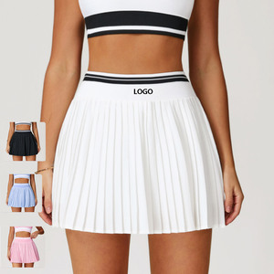 Jupe plissée avec short intégré, taille haute contrastée, en spandex/nylon respirant, élégante et luxueuse pour femmes, avec logo personnalisé - Product Image 1