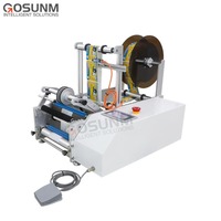 Machine d'étiquetage d'autocollants de bouteilles en rouleau de bouteilles semi-automatique applicateur d'étiquettes manuel à double tête pour petites bouteilles
