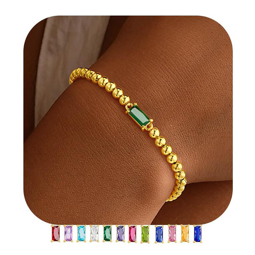 สร้อยข้อมือลูกปัดมรกตและทอง