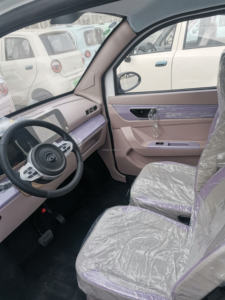 2025 modelo más nuevo 2 puertas 4 asientos adultos Mini coches de vehículos eléctricos para damas y ancianos - Product Image 3