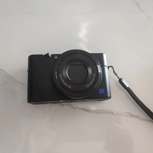 กล้องมือสองสภาพดี Sony <span class=keywords><strong>RX100</strong></span> <span class=keywords><strong>II</strong></span> 20.1MP ถ่ายภาพ Full HD เหมาะสำหรับการเรียนรู้การถ่ายภาพ กล้องออลอินวัน - Product Image 1