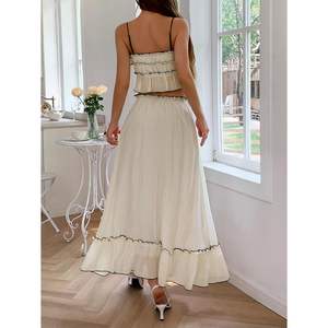 ชุดเซ็ต 2 ชิ้นสำหรับผู้หญิง รุ่นคัสตอม 2026 เสื้อครอปแขนกุด กระโปรงยาวผ้าชีฟองระบายอากาศดี เหมาะสำหรับฤดูร้อน - Product Image 1