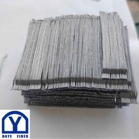 Fibre d'ancrage en acier collée 3D 80/60 BG 0,75 mm x 60 mm avec extrémités crochées pour pavés en béton
