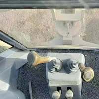 Chargeuse-pelleteuse d'occasion de 7,8 tonnes en stock avec godet de chargement avant et bras d'excavation arrière pour le marché mondial